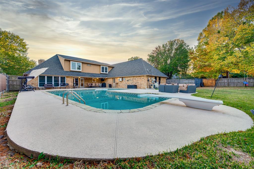 4115 Alpine Street Paris, TX 75462 - Photo 34 of 40 a view of house with yard and green space