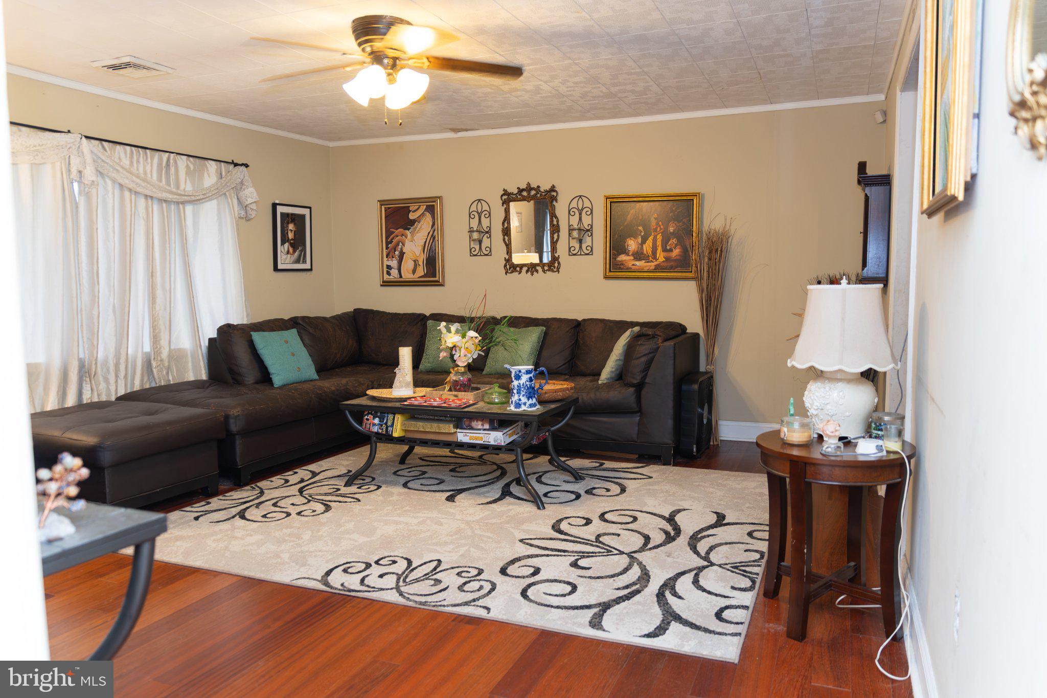 26 Plumtree Road Levittown, PA 19056 - Photo 7 of 16 Inviting living space with warm tones.