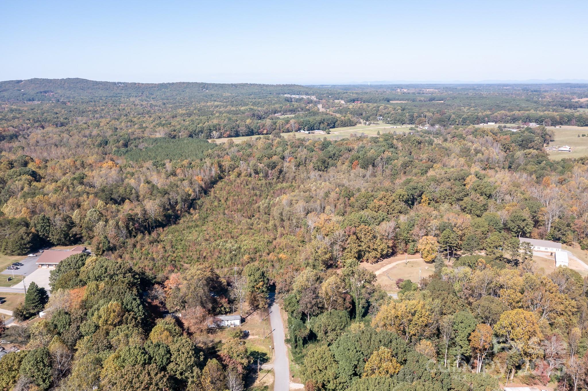4343 Mt Pleasant Road Denver, NC 28037 - Photo 10 of 10 an aerial view of mountain with trees around