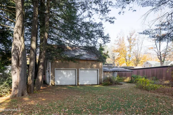 a view of a house with a back yard