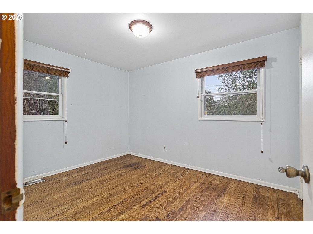 14035 Southeast Harrison Street Portland, OR 97233 - Photo 13 of 32 a view of an empty room with a window