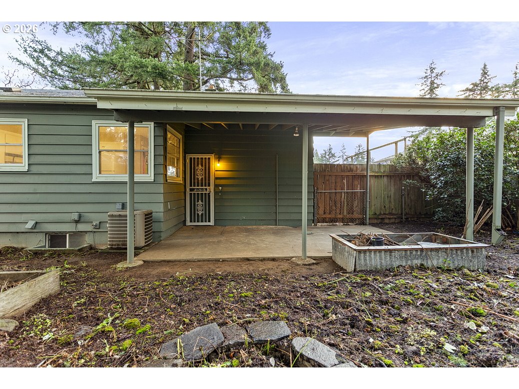 14035 Southeast Harrison Street Portland, OR 97233 - Photo 29 of 32 a porch with a bench in front of it
