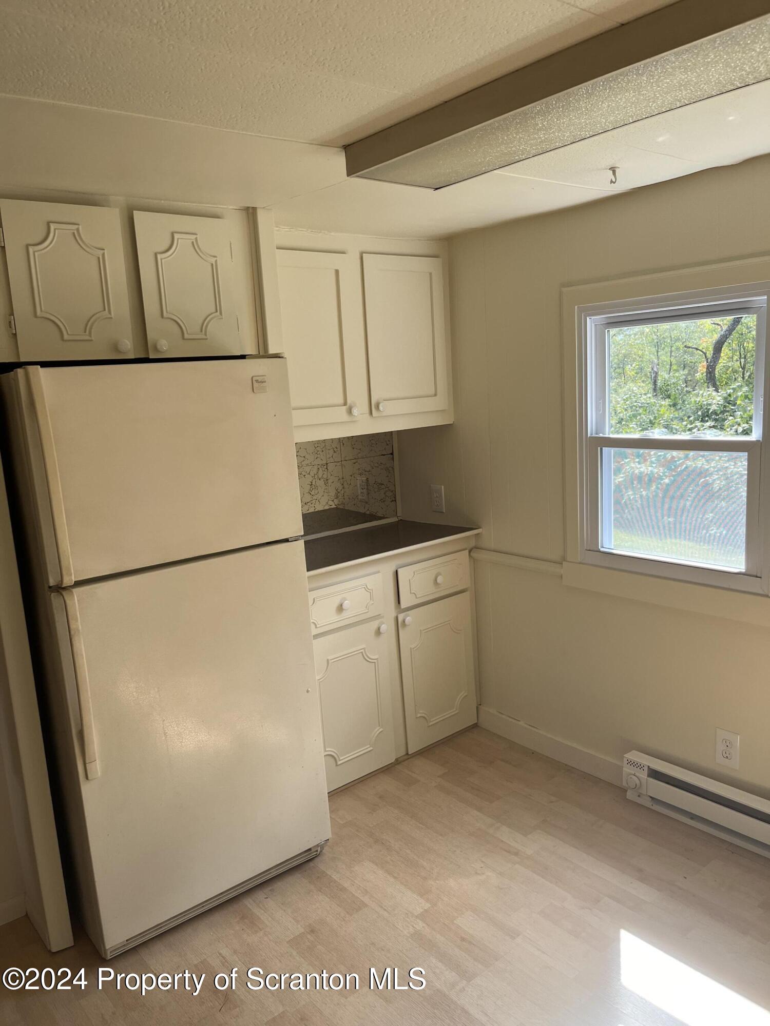 64 Franklin Street Great Bend, PA 18821 - Photo 12 of 33 a utility room with dryer and washer