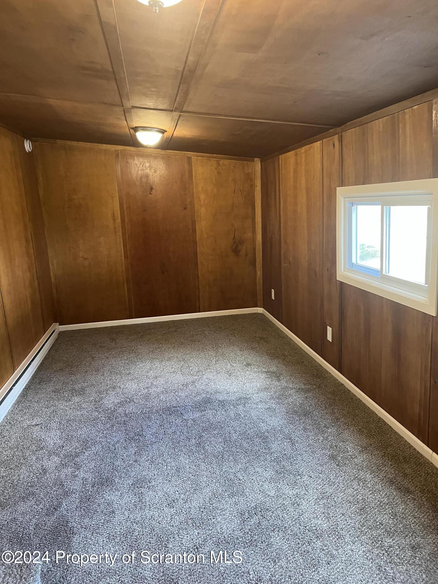 64 Franklin Street Great Bend, PA 18821 - Photo 16 of 33 an empty room with windows