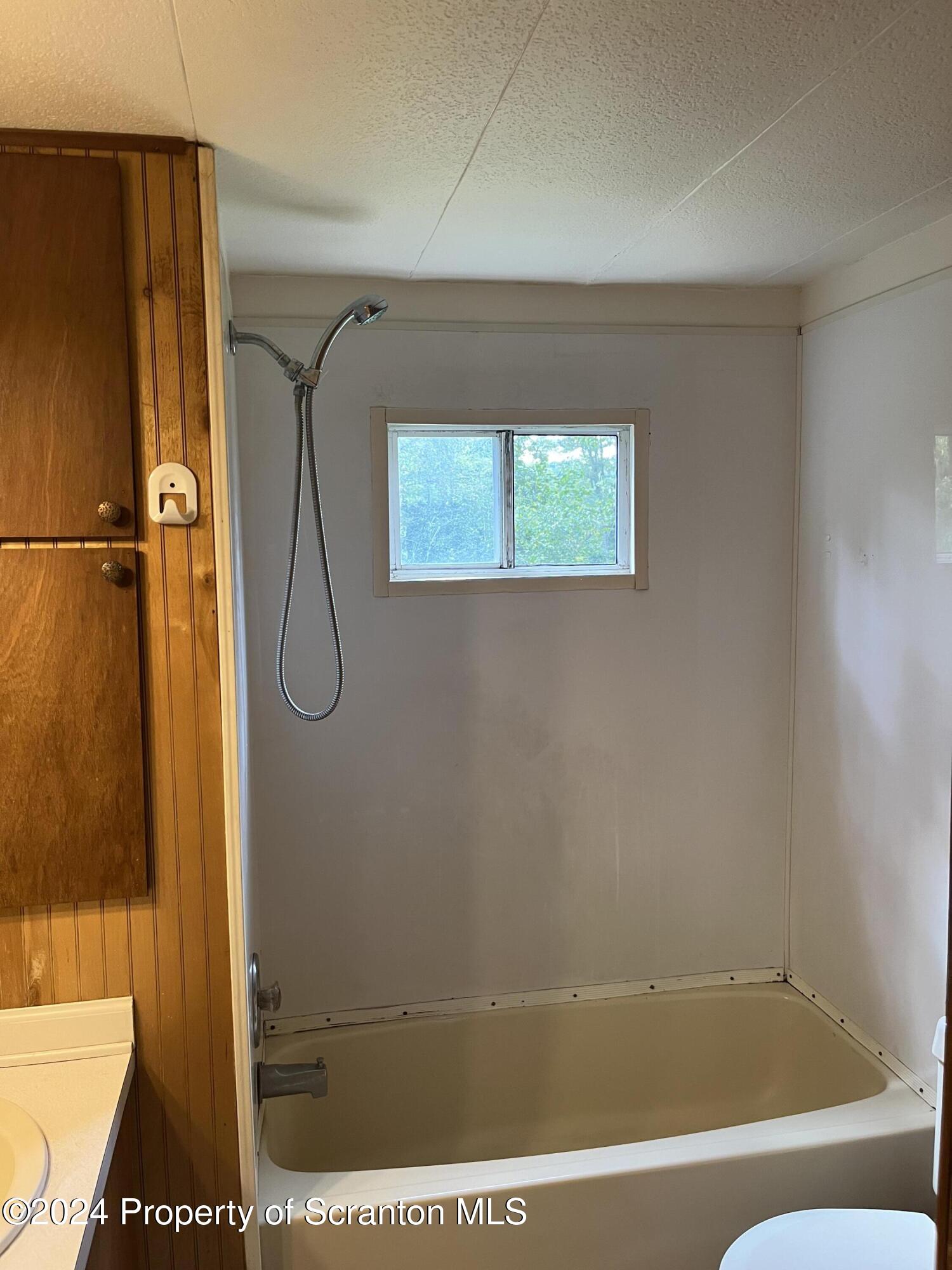 64 Franklin Street Great Bend, PA 18821 - Photo 19 of 33 a bathroom with a shower