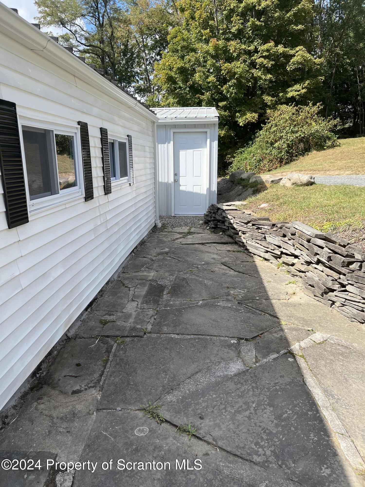 64 Franklin Street Great Bend, PA 18821 - Photo 2 of 33 a view of a backyard of the house