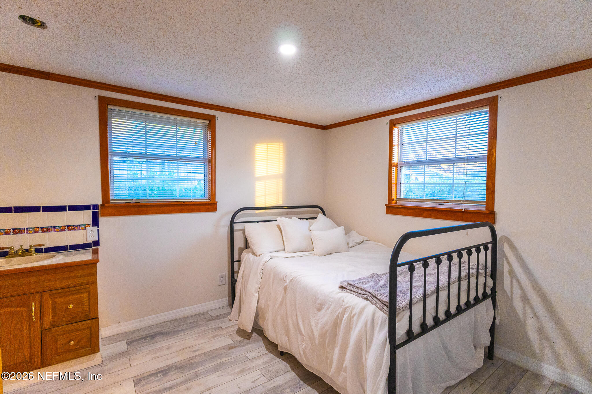 110 Jimmie Road Crescent City, FL 32112 - Photo 14 of 54 a bedroom with a bed and a window