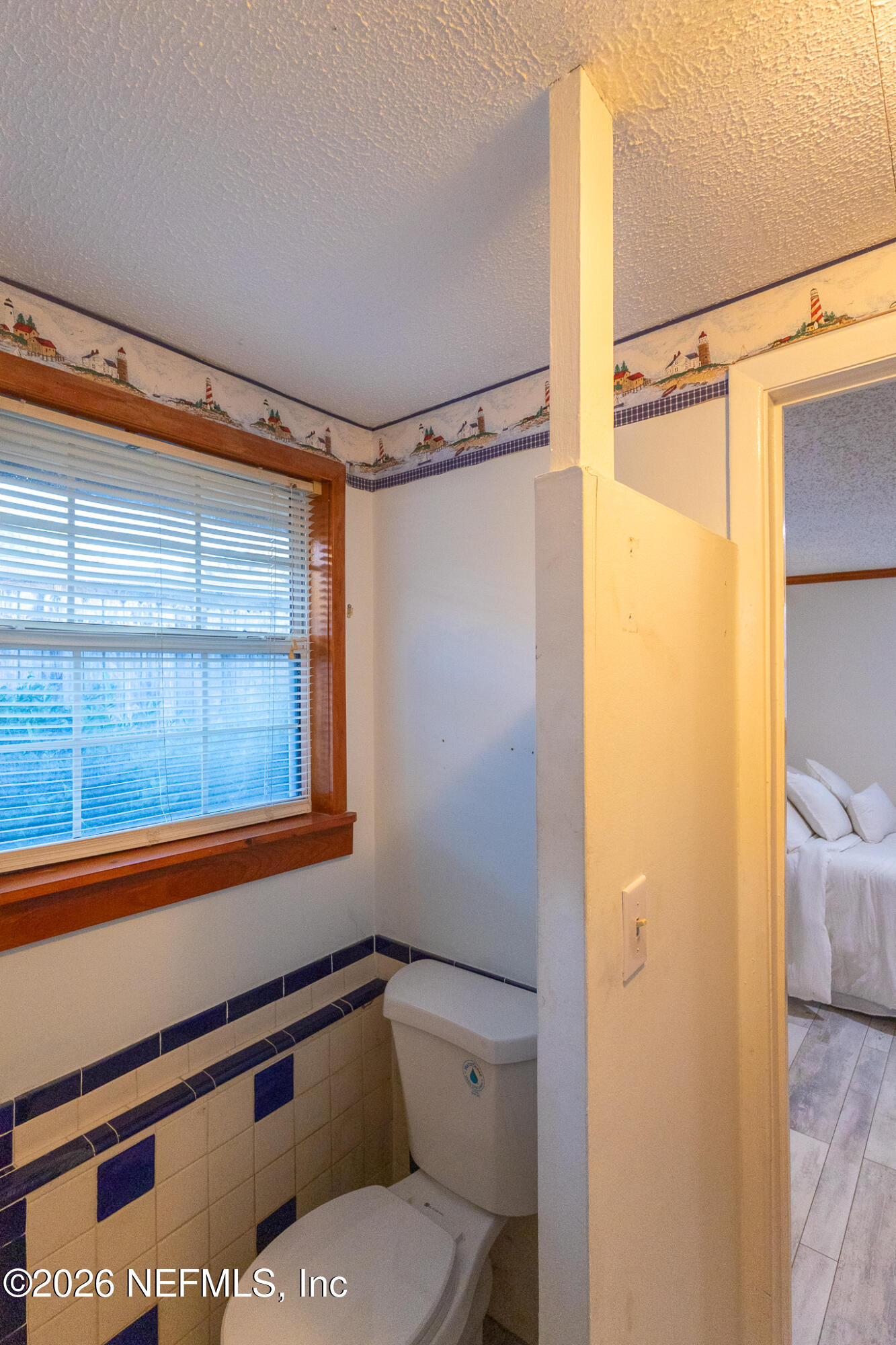 110 Jimmie Road Crescent City, FL 32112 - Photo 16 of 54 a bathroom with a shower a sink and a toilet