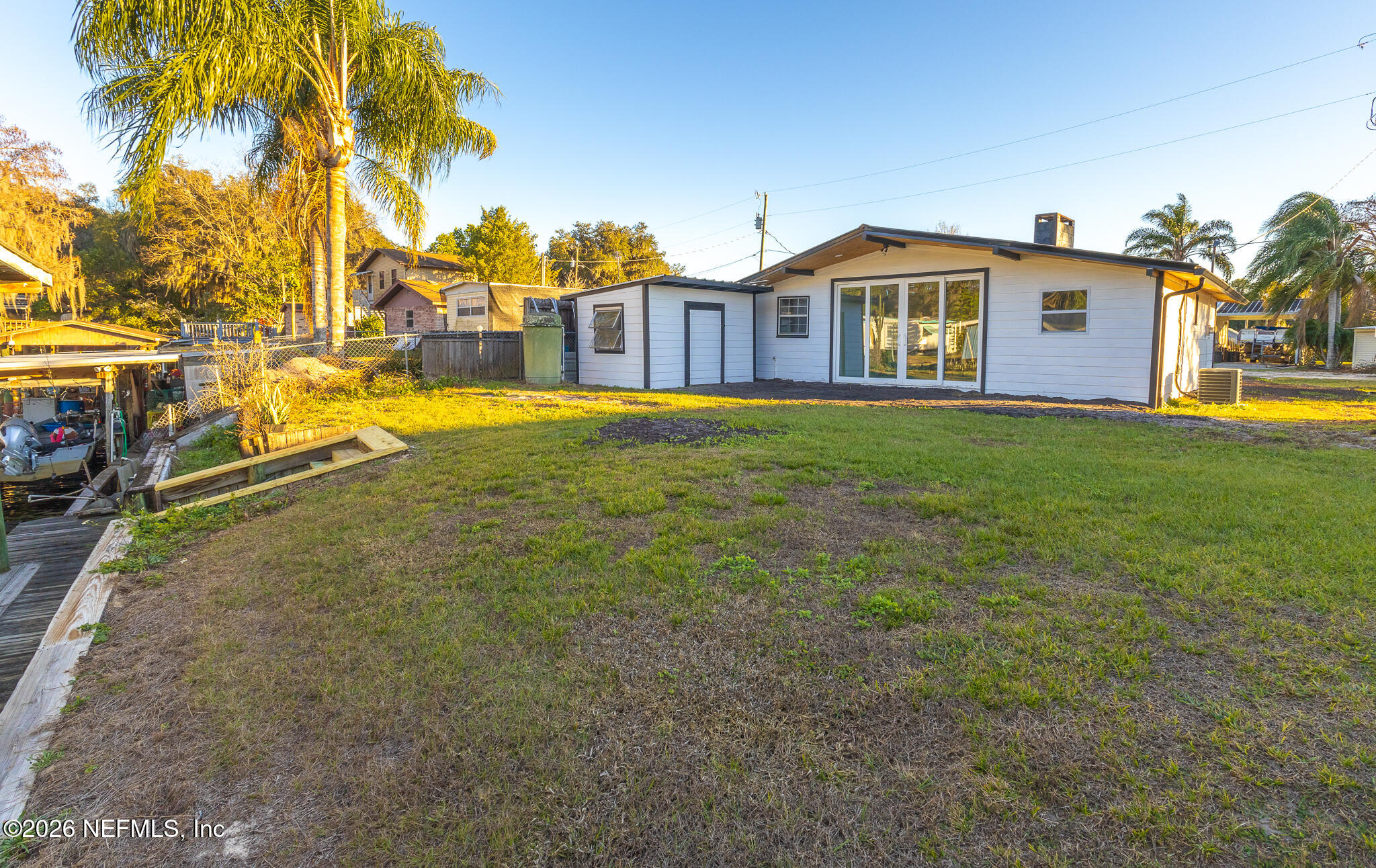 110 Jimmie Road Crescent City, FL 32112 - Photo 22 of 54 a view of a house with a backyard