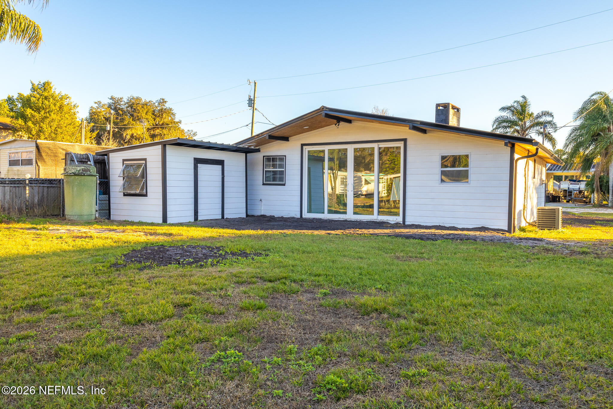 110 Jimmie Road Crescent City, FL 32112 - Photo 23 of 54 a front view of house with yard and swimming pool
