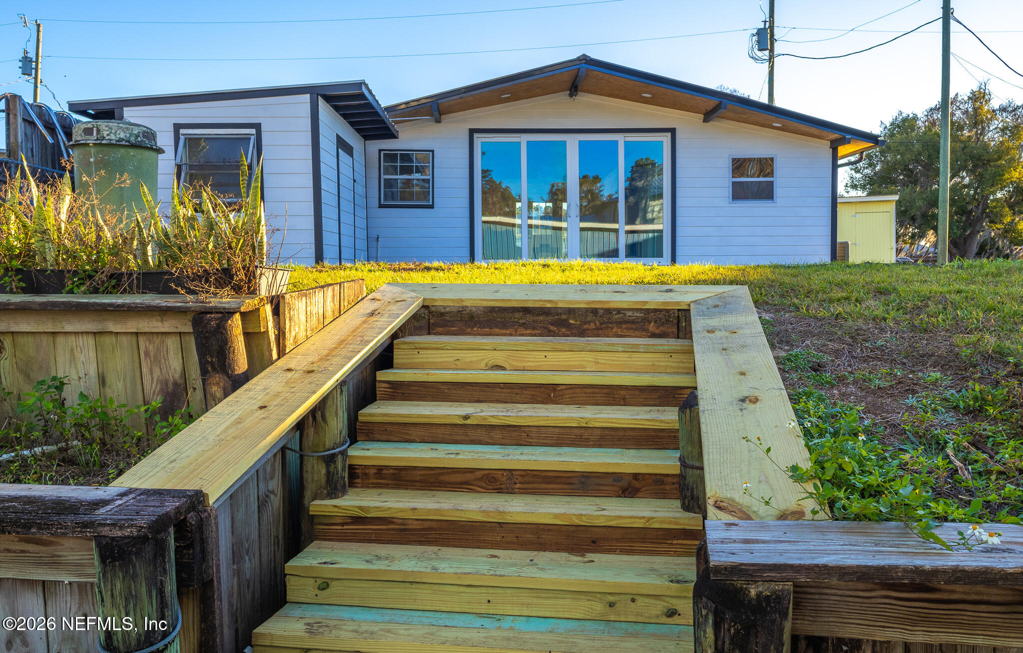 110 Jimmie Road Crescent City, FL 32112 - Photo 24 of 54 a front view of a house with a yard