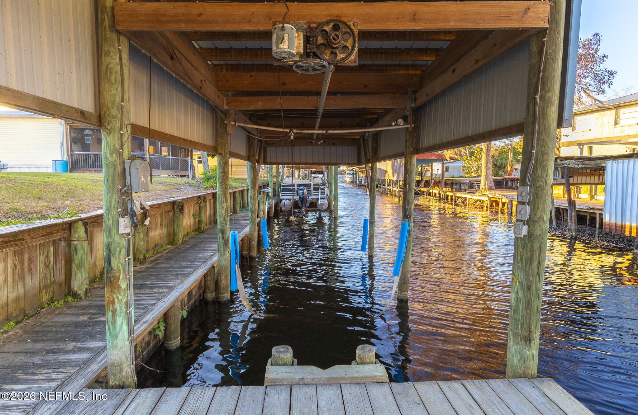 110 Jimmie Road Crescent City, FL 32112 - Photo 30 of 54 a walk in closet with wooden floor