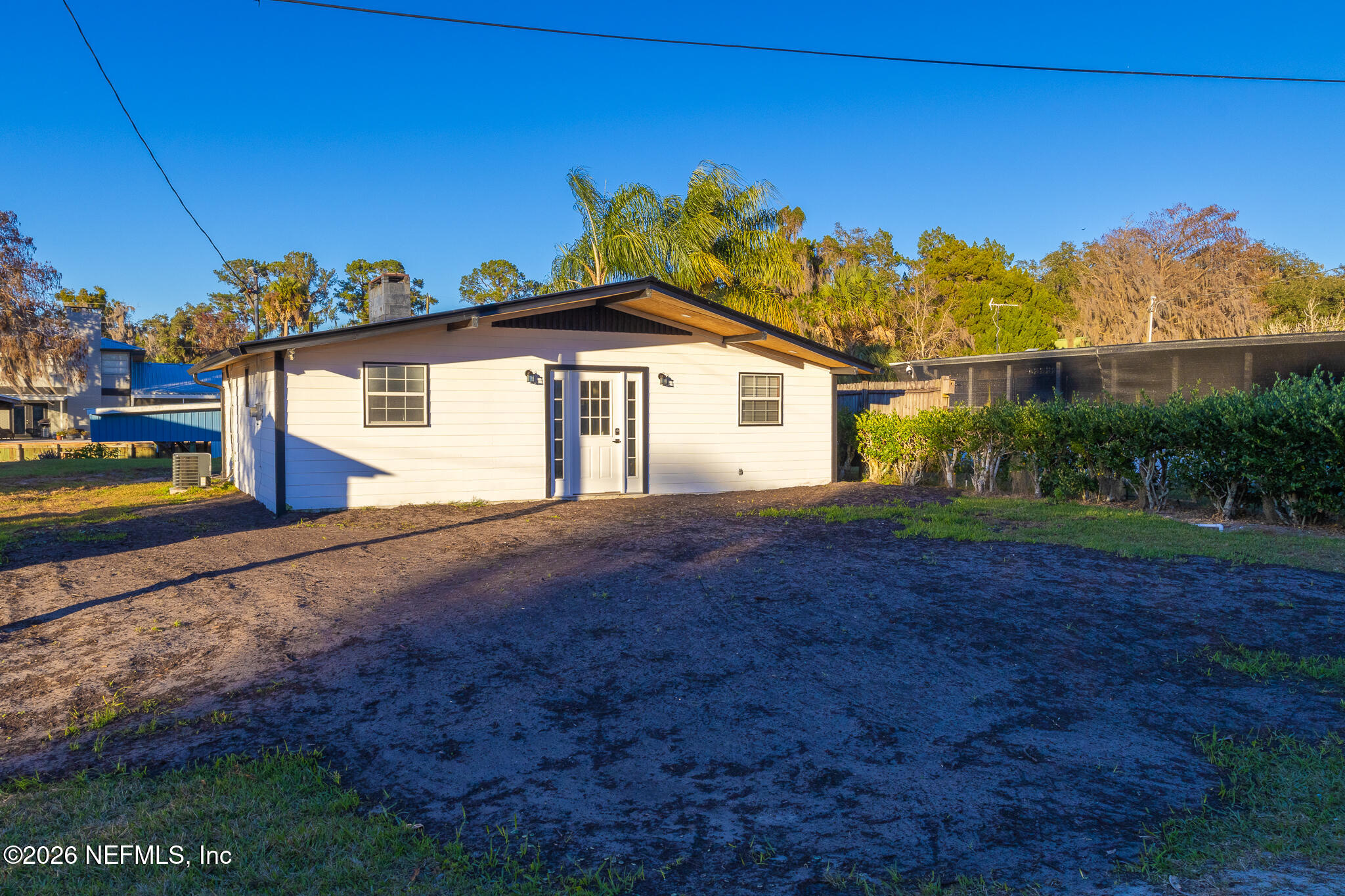 110 Jimmie Road Crescent City, FL 32112 - Photo 34 of 54 a front view of a house with a yard