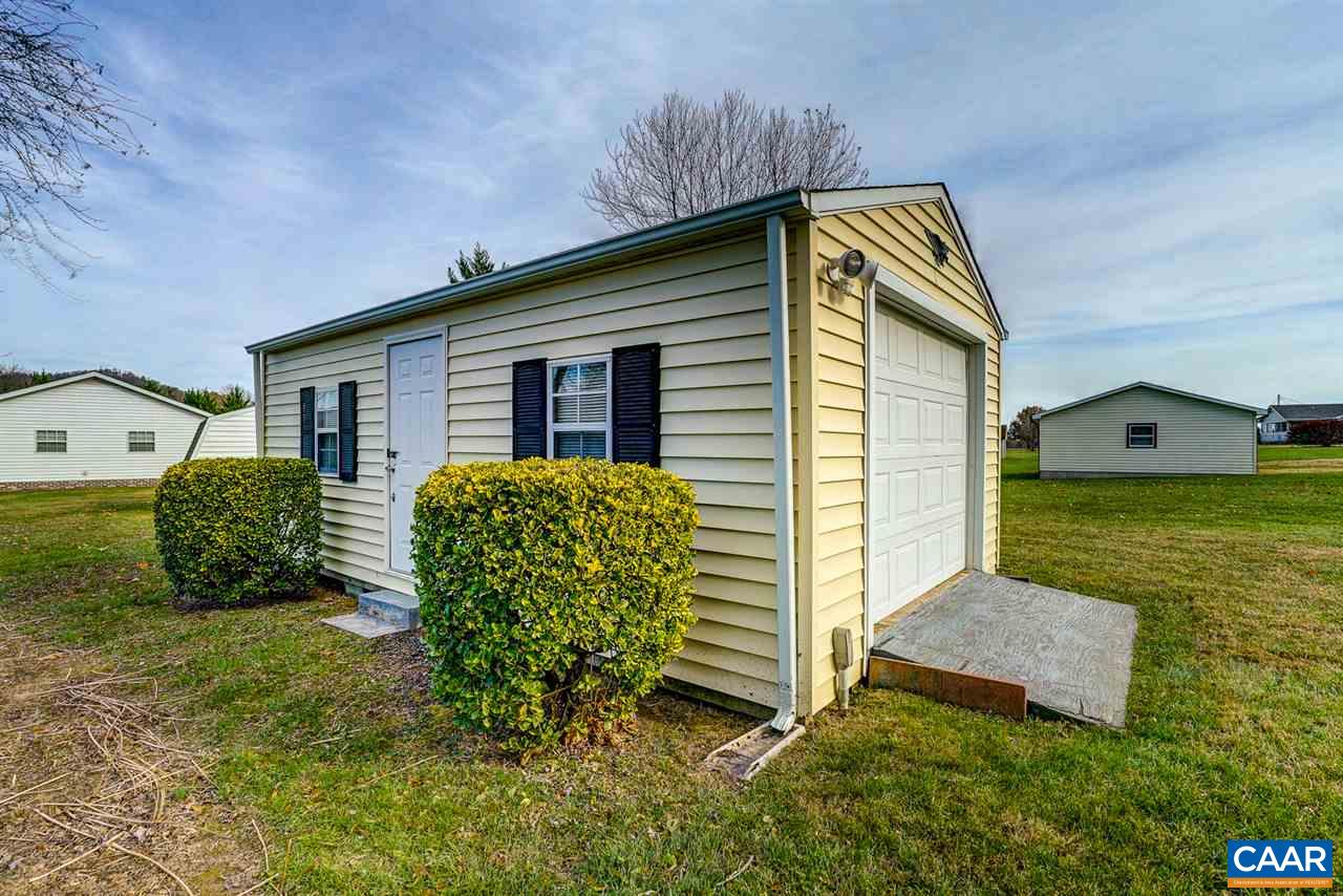 43 March Road Stanardsville, VA 22973 - Photo 24 of 26 a view of a house with backyard and garden