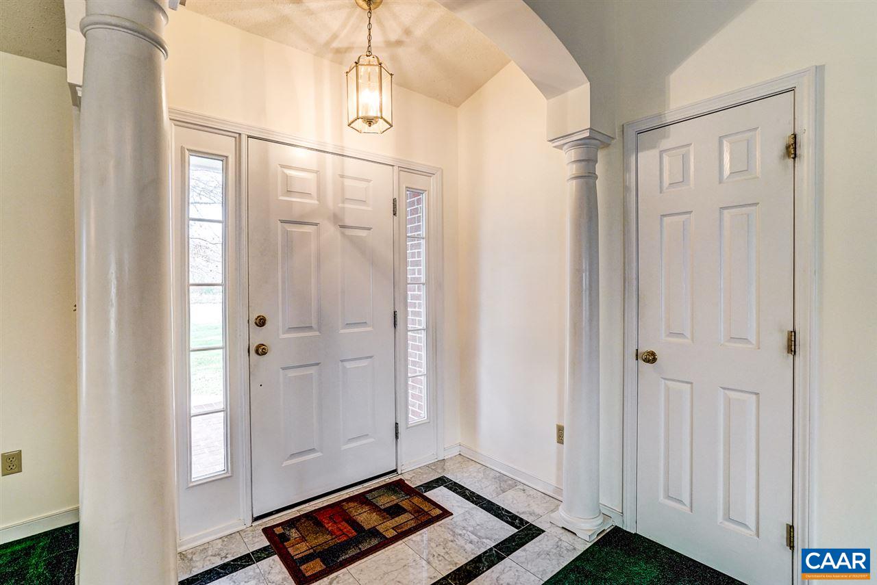 43 March Road Stanardsville, VA 22973 - Photo 6 of 26 a view of an entryway with wooden floor