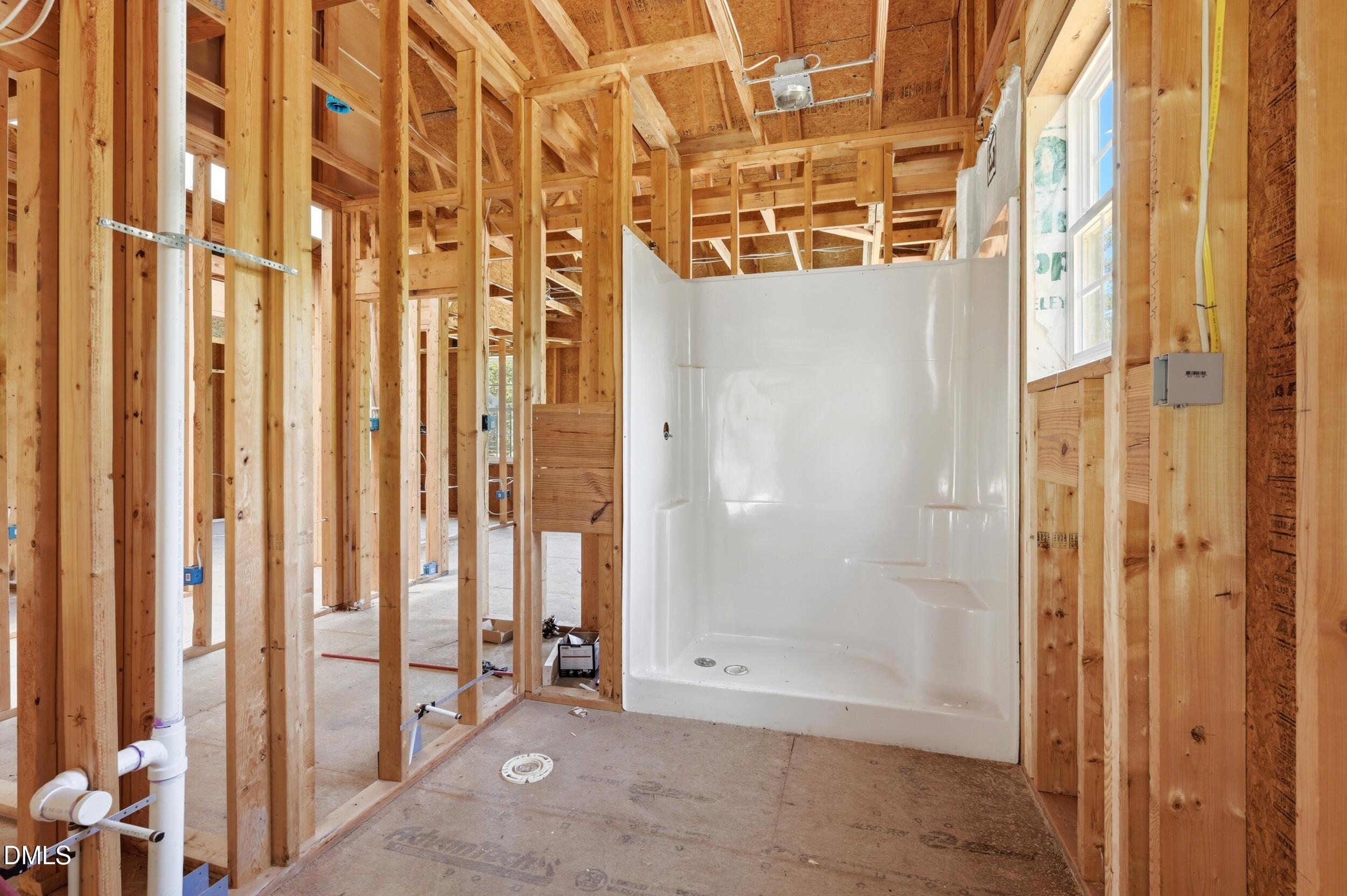 129 Shaman Drive Spring Hope, NC 27882 - Photo 22 of 43 a view of an empty room with a window