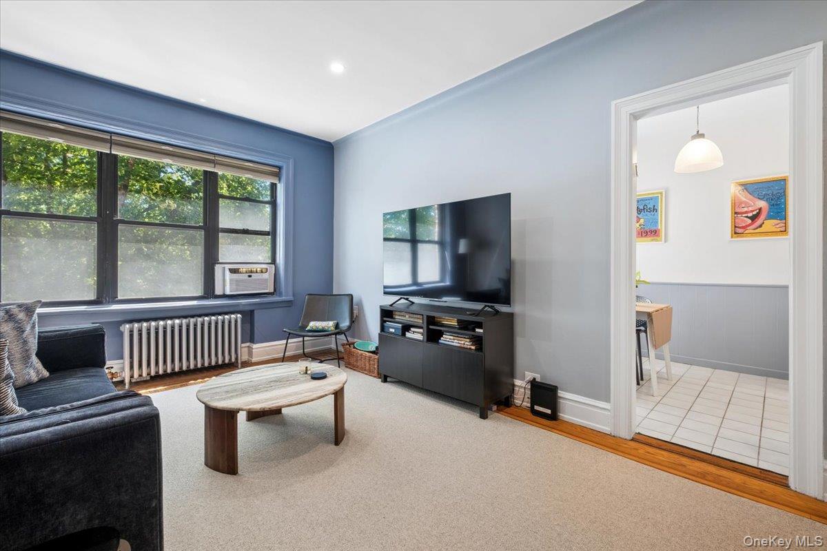 143 Garth Road, Unit 5L Scarsdale, NY 10583 - Photo 7 of 22 Living room w/ large windows