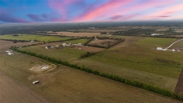 a view of a lake with a big yard