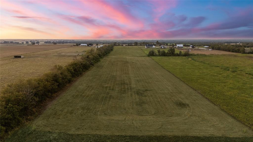 8153 Prairie Chapel Road Crawford, TX 76638 - Photo 27 of 32 a view of a lake with a city