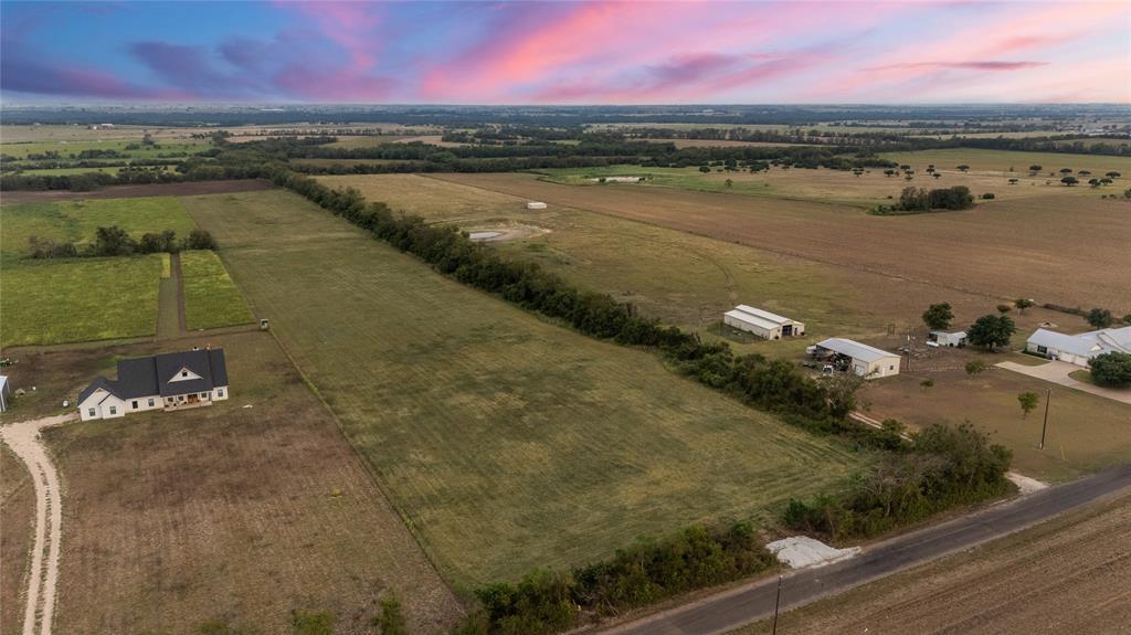 8153 Prairie Chapel Road Crawford, TX 76638 - Photo 5 of 32 a view of a lake with a mountain