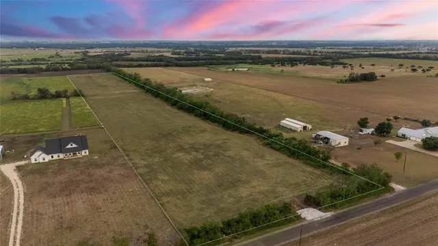 a view of a city with an ocean view