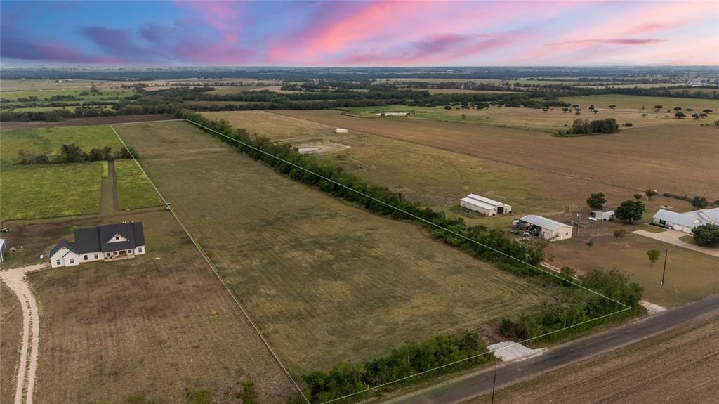 8153 Prairie Chapel Road Crawford, TX 76638 - Photo 6 of 32 a view of a city with an ocean view