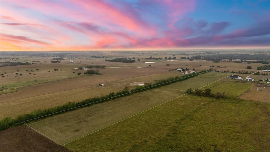 8153 Prairie Chapel Road Crawford, TX 76638 - Photo 10 of 32 a view of a lake with beach and city