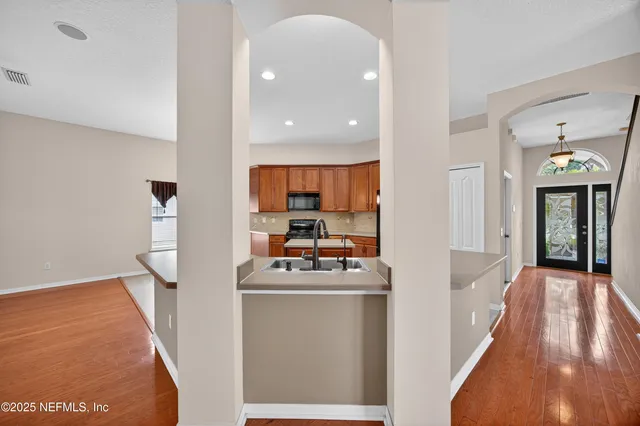 a view of a kitchen cabinets and a stove