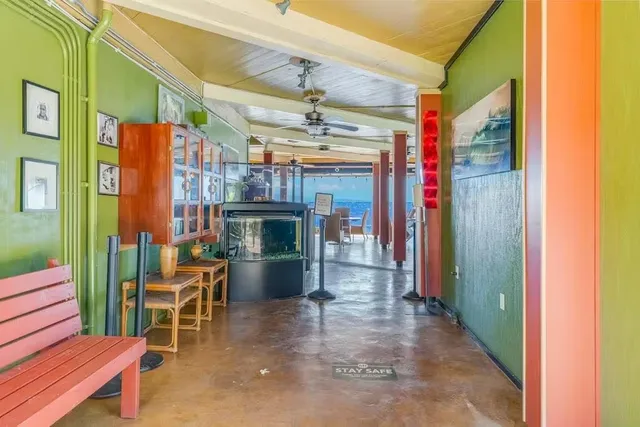 a view of living room and patio