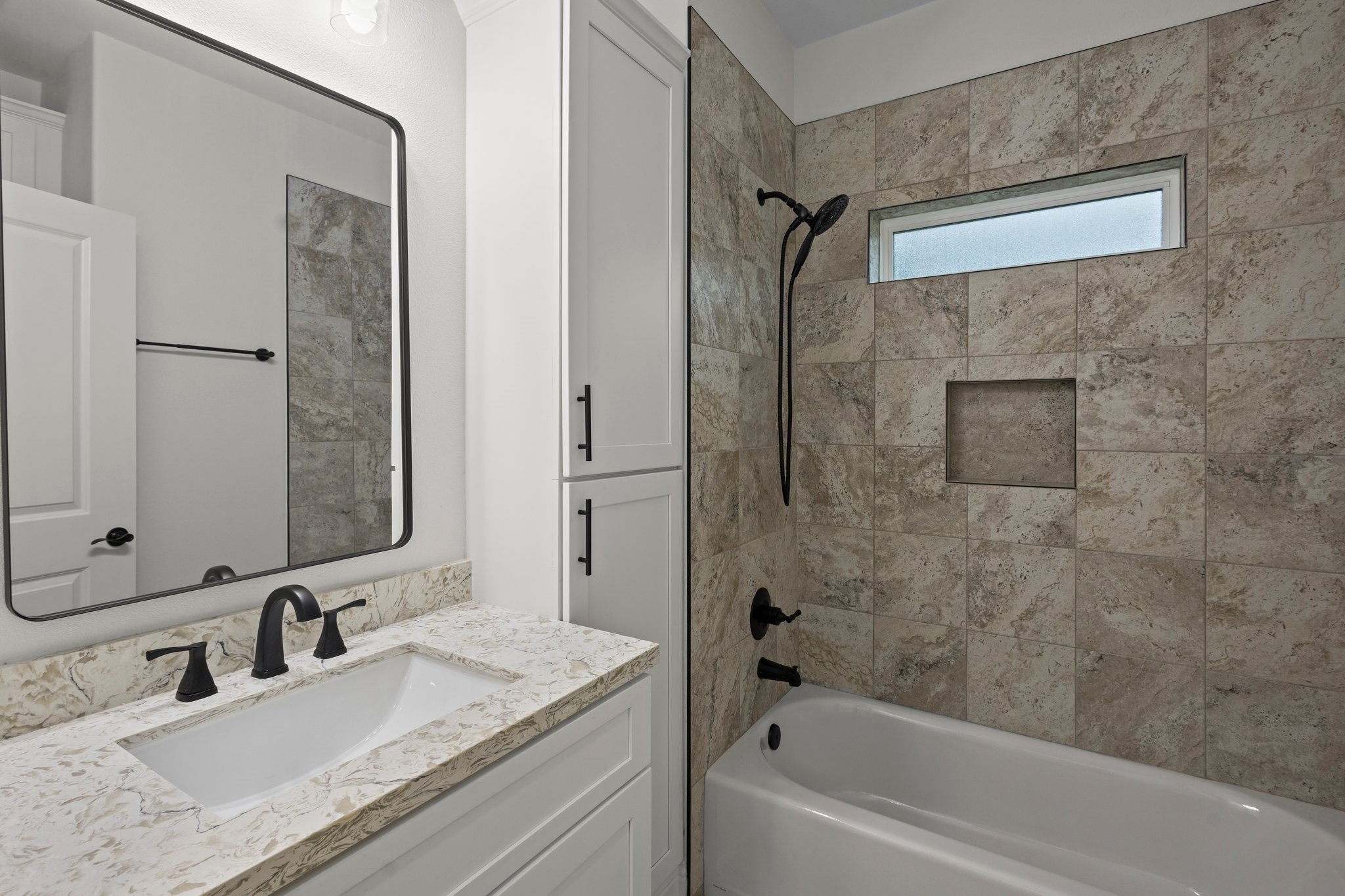 5250 HIghlander Drive Orange, TX 77630 - Photo 17 of 20 a bathroom with a granite countertop bathtub shower sink vanity and mirror