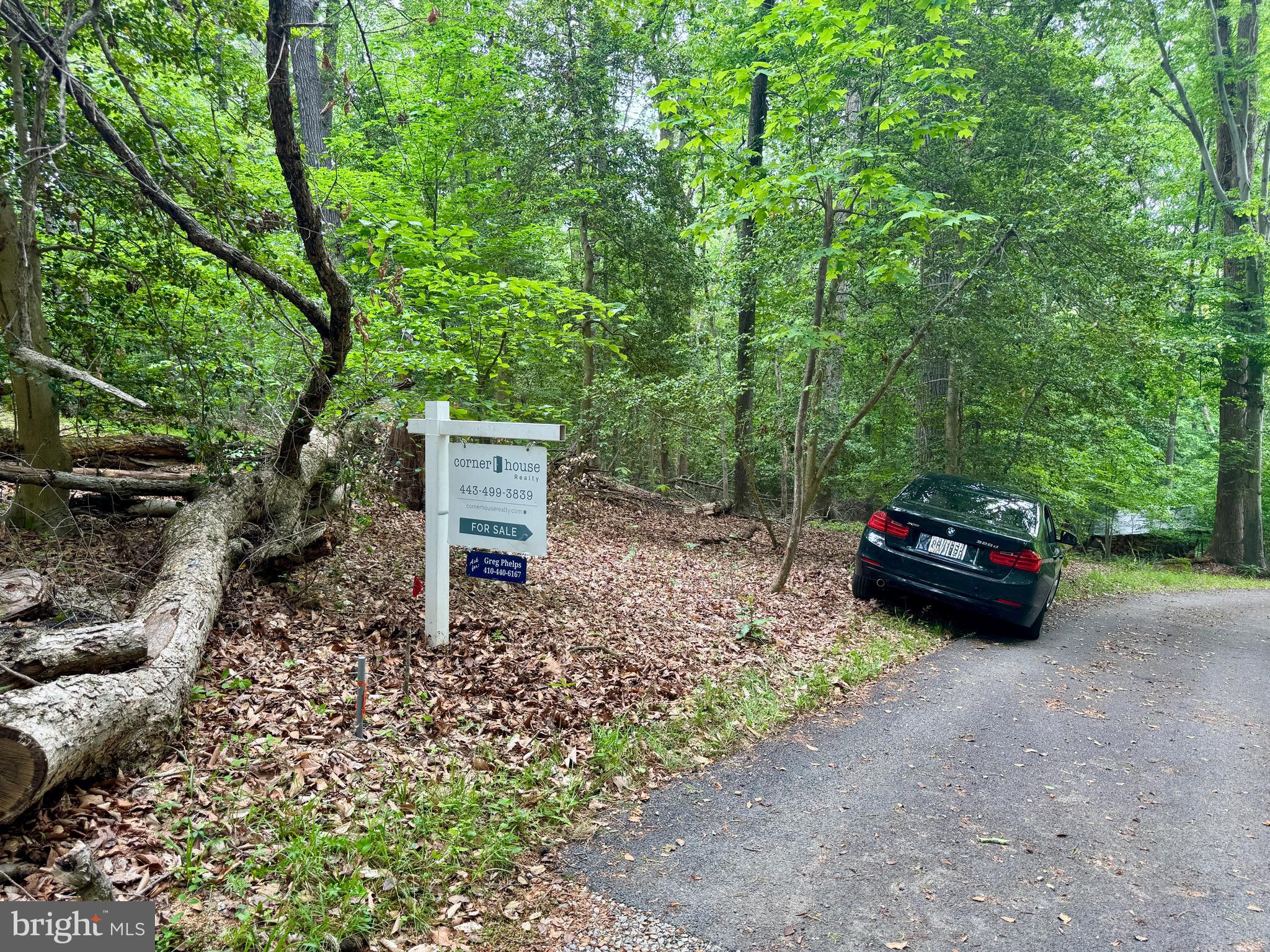 Hidden Valley Road Accokeek, MD 20607 - Photo 5 of 23 a car parked in front of a road