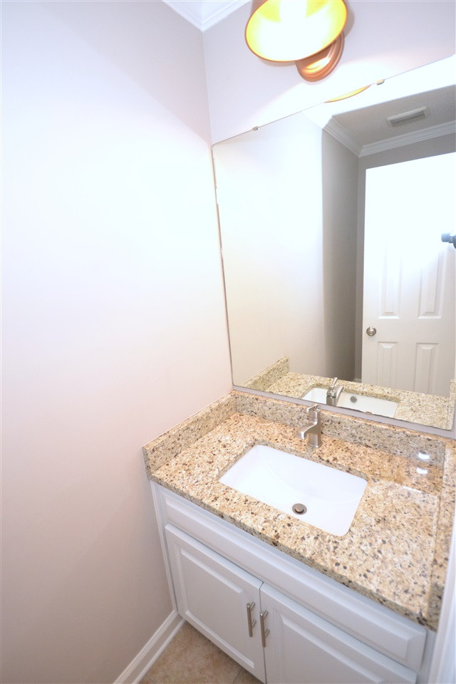 7704 Hilburn Drive Raleigh, NC 27613 - Photo 19 of 21 Half Bath