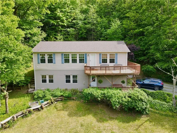 front view of a house with a yard