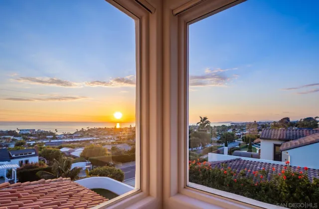 a view of a balcony with city view