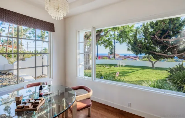 a living room with furniture and a yard