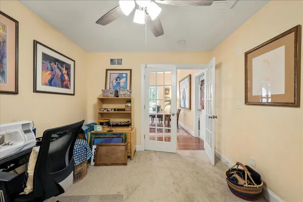 a view of a workspace with furniture