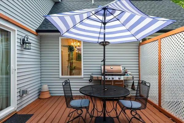 a view of a porch with wooden floor