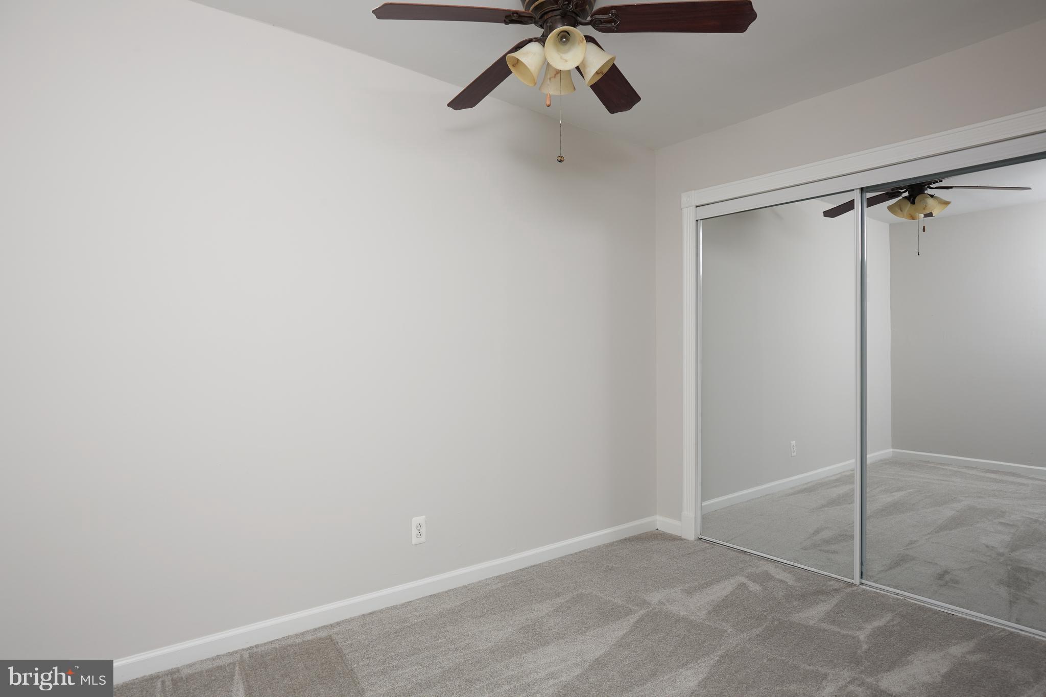 4004 Beecher Street Northwest, Unit 102 Washington, DC 20007 - Photo 11 of 24 a view of a room with rack on the wall