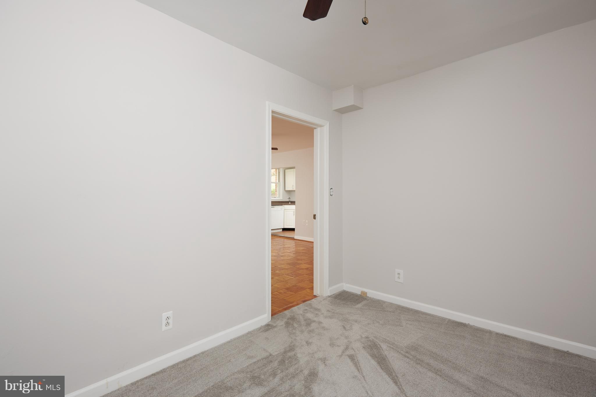 4004 Beecher Street Northwest, Unit 102 Washington, DC 20007 - Photo 12 of 24 a view of an empty room