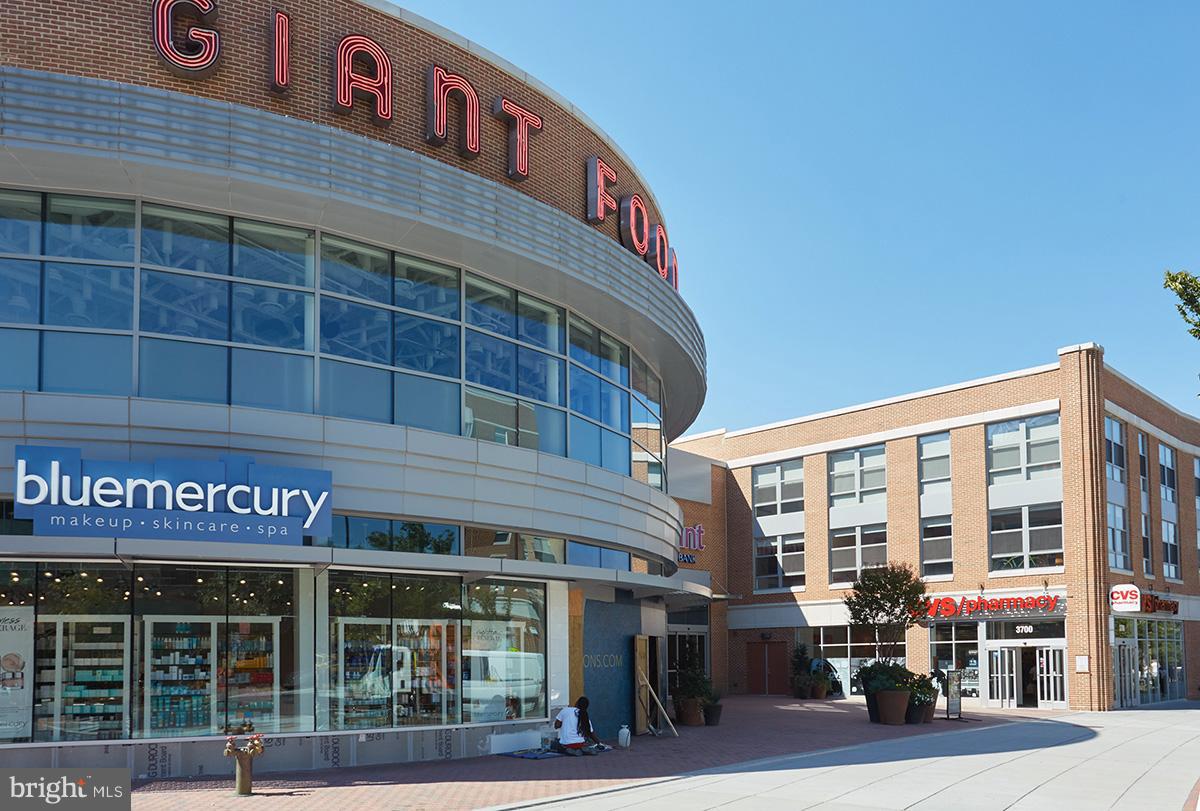 4004 Beecher Street Northwest, Unit 102 Washington, DC 20007 - Photo 16 of 24 a front view of multi story building