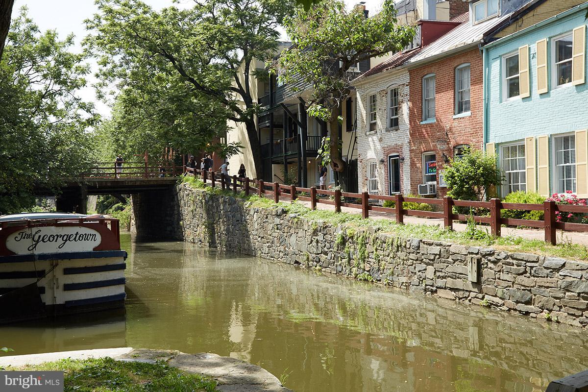 4004 Beecher Street Northwest, Unit 102 Washington, DC 20007 - Photo 19 of 24 a view of a house with backyard