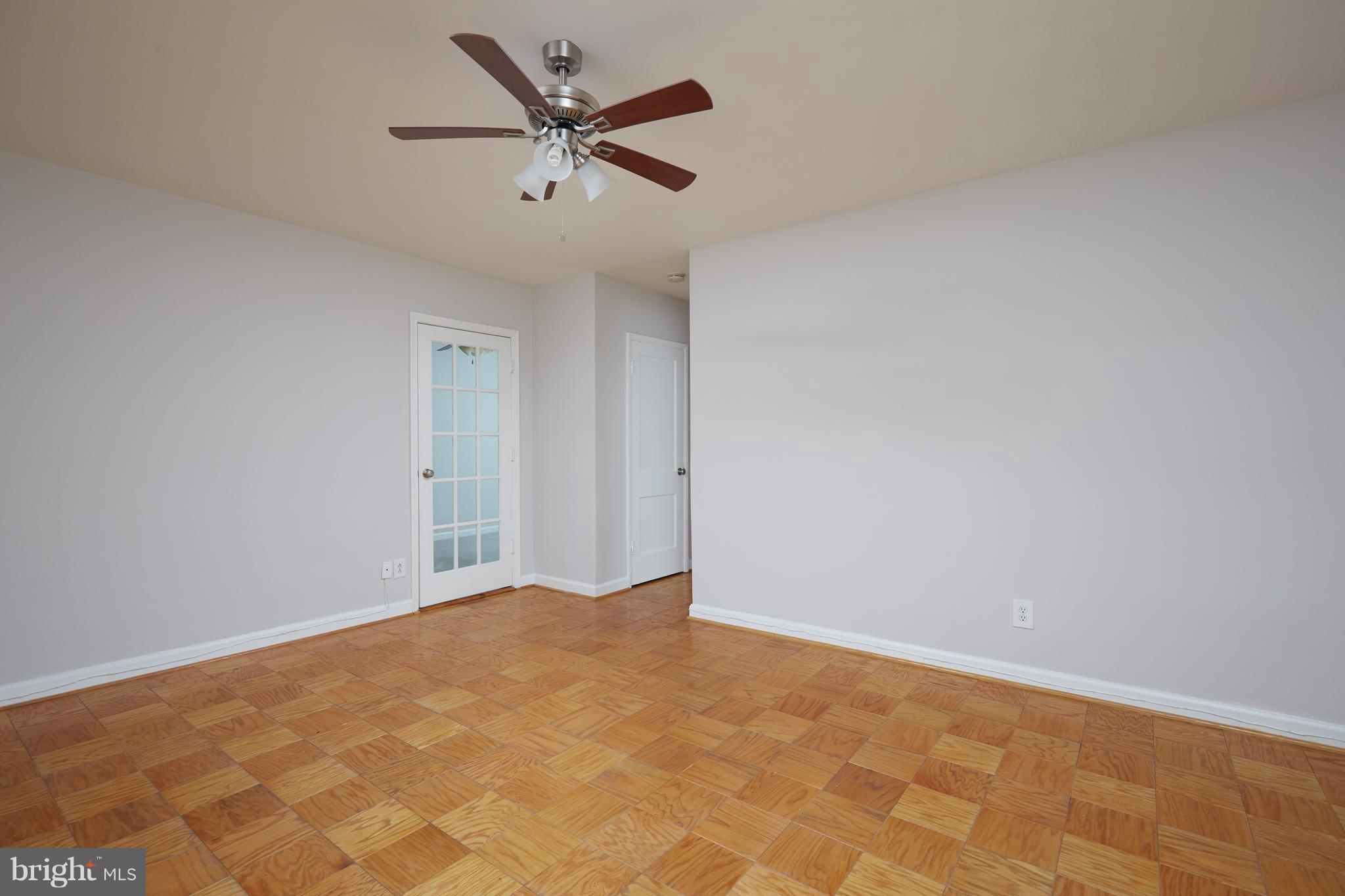 4004 Beecher Street Northwest, Unit 102 Washington, DC 20007 - Photo 3 of 24 a view of a big room with carpet
