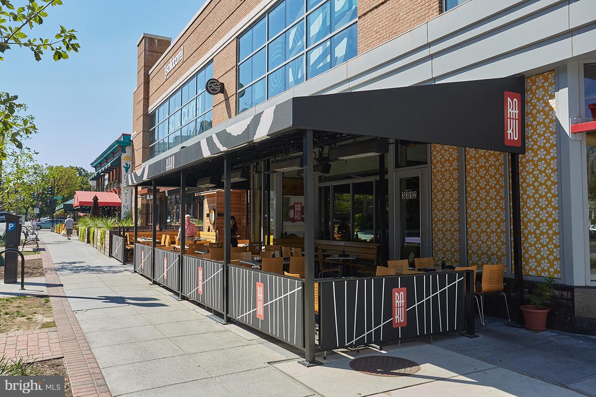 4004 Beecher Street Northwest, Unit 102 Washington, DC 20007 - Photo 21 of 24 a view of street with shops