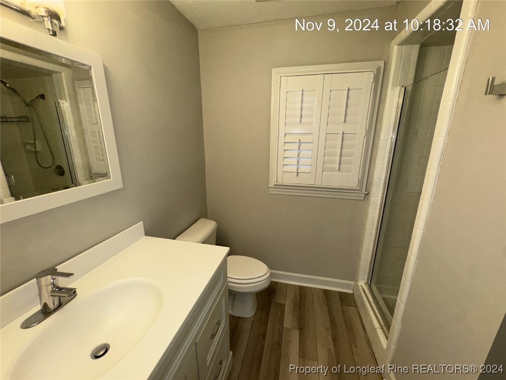 1429 Pine Valley Loop Fayetteville, NC 28305 - Photo 19 of 27 a bathroom with a sink and a tub