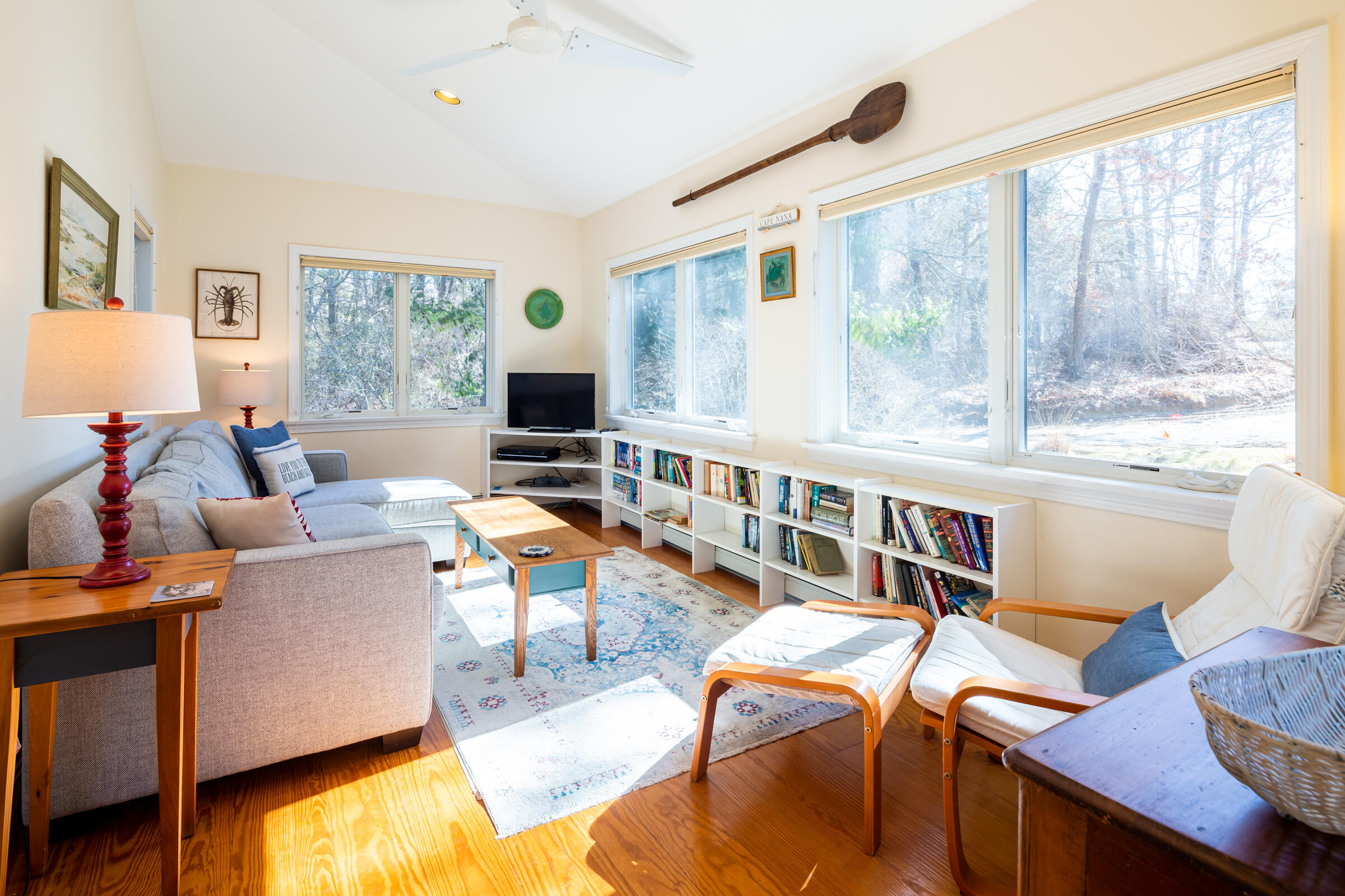 40 Chestnut Drive Orleans, MA 02653 - Photo 12 of 40 a living room with furniture and a large window