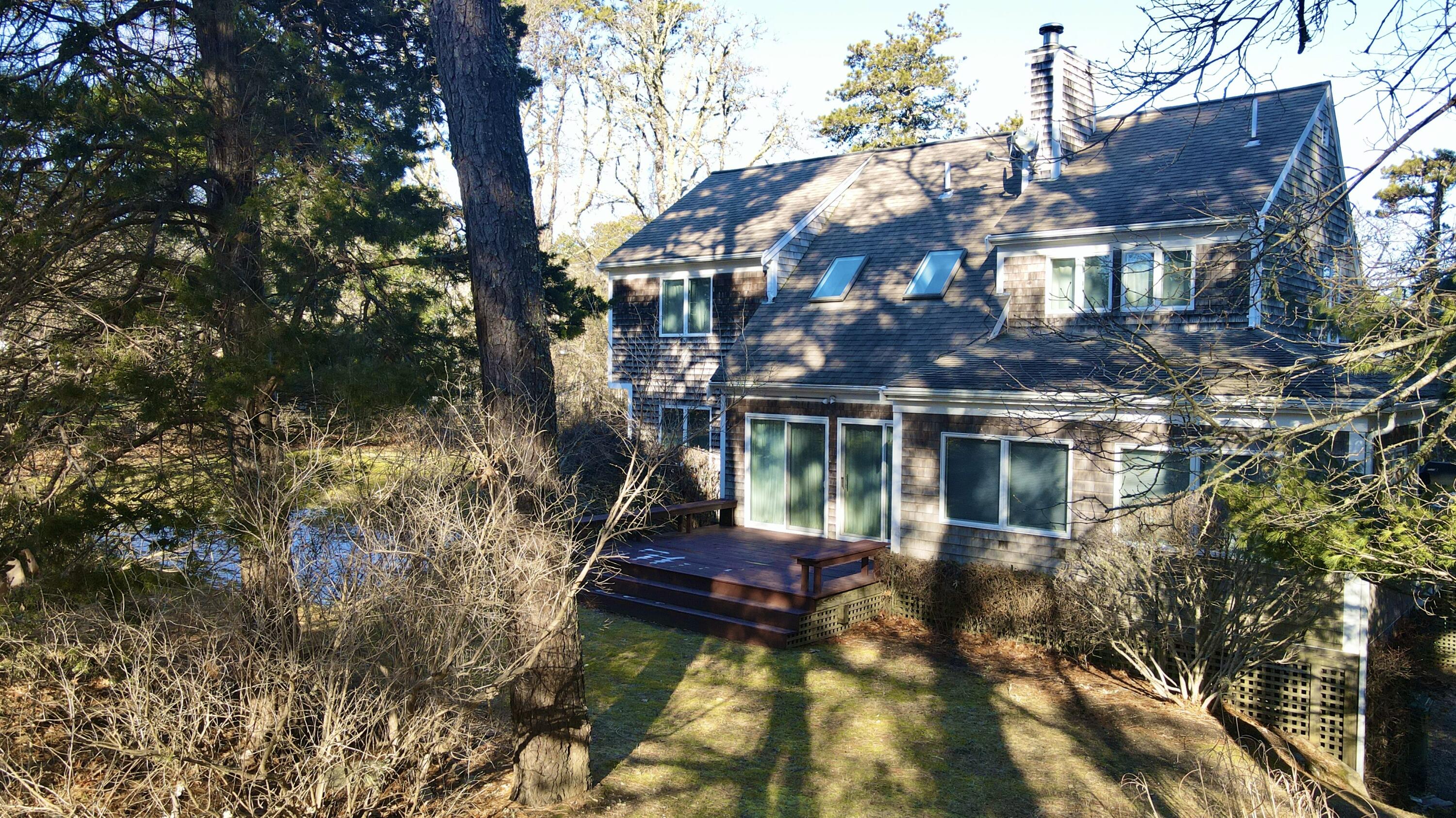 40 Chestnut Drive Orleans, MA 02653 - Photo 32 of 40 a front view of house and yard