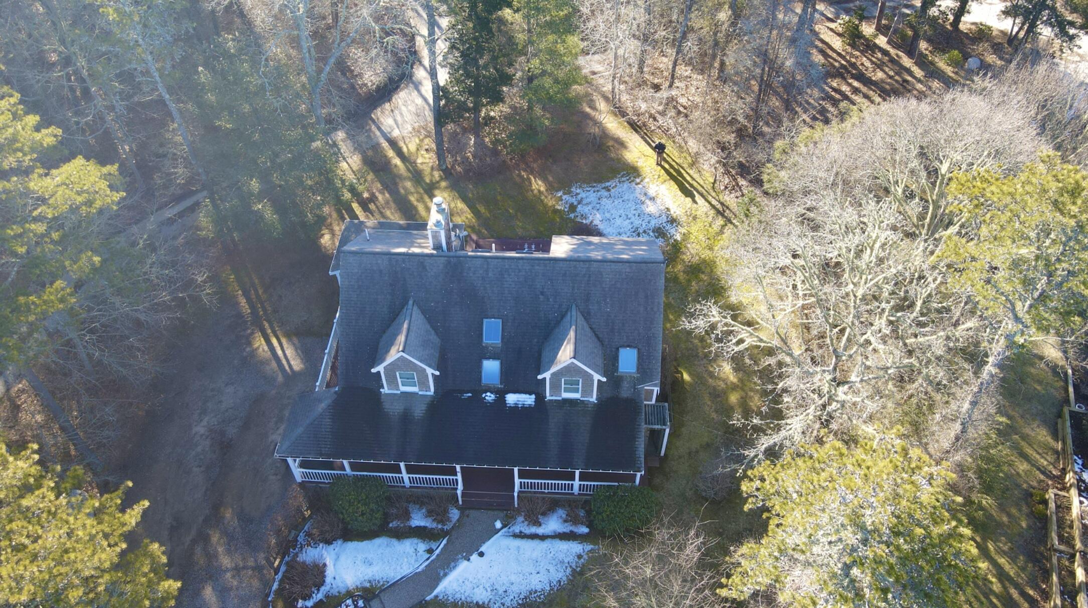 40 Chestnut Drive Orleans, MA 02653 - Photo 33 of 40 front view of a house with a yard
