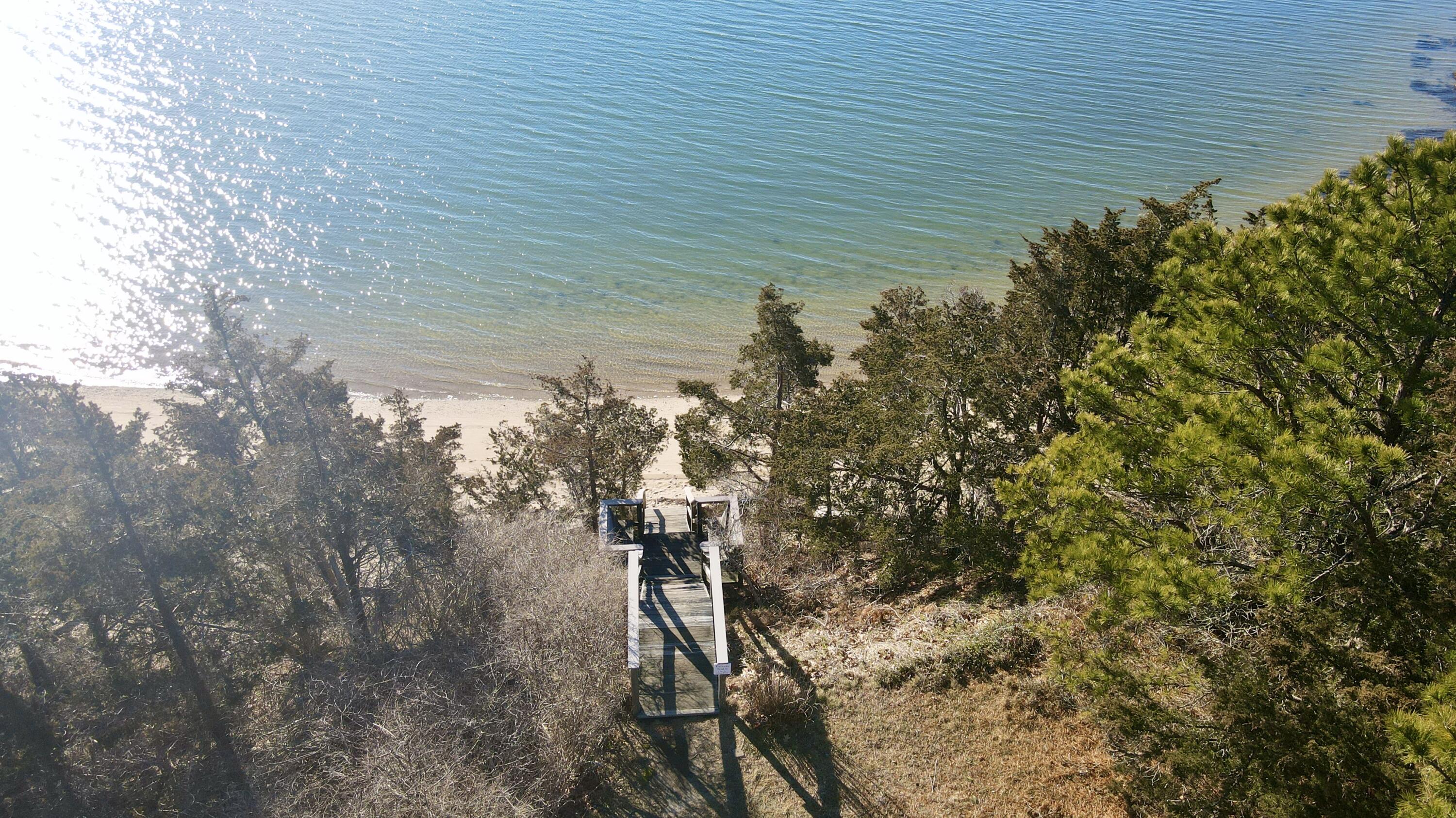 40 Chestnut Drive Orleans, MA 02653 - Photo 38 of 40 a view of a pathway both side of a house