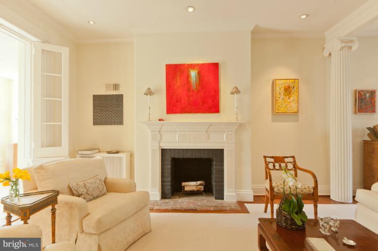 3122 N Street Northwest Washington, DC 20007 - Photo 12 of 19 a living room with furniture and a fireplace