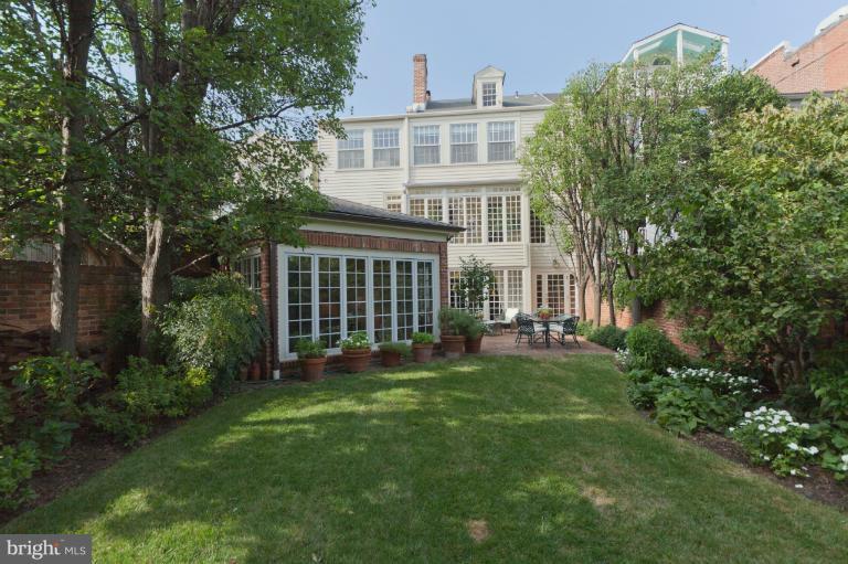 3122 N Street Northwest Washington, DC 20007 - Photo 3 of 19 a front view of a house with a garden